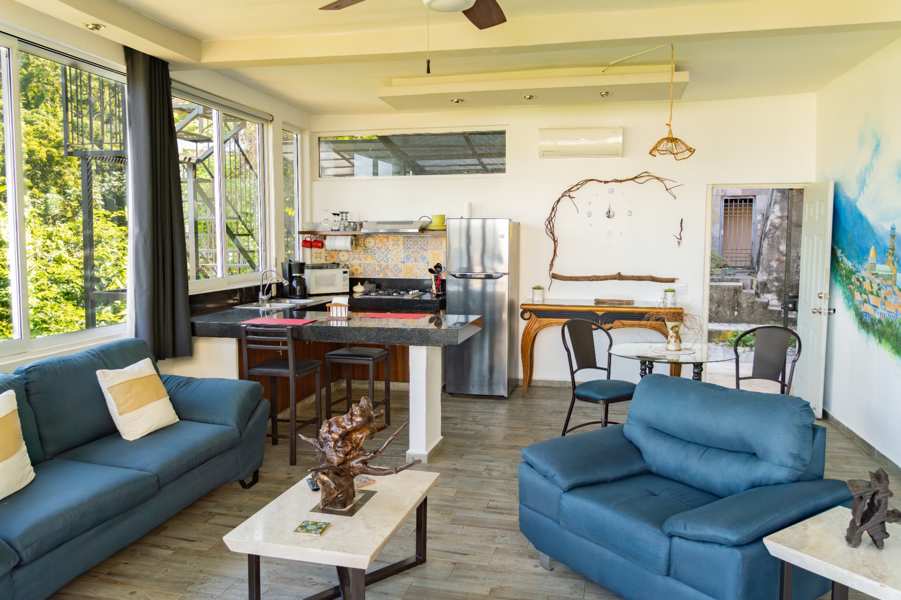 Bright open-concept condo living area