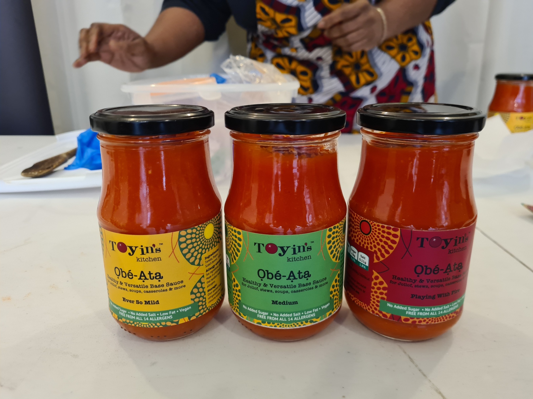 Obé-Ata by Toyin’s Kitchen: close-up of plant-based cooking sauce jars/flavours (free from 14 allergens)