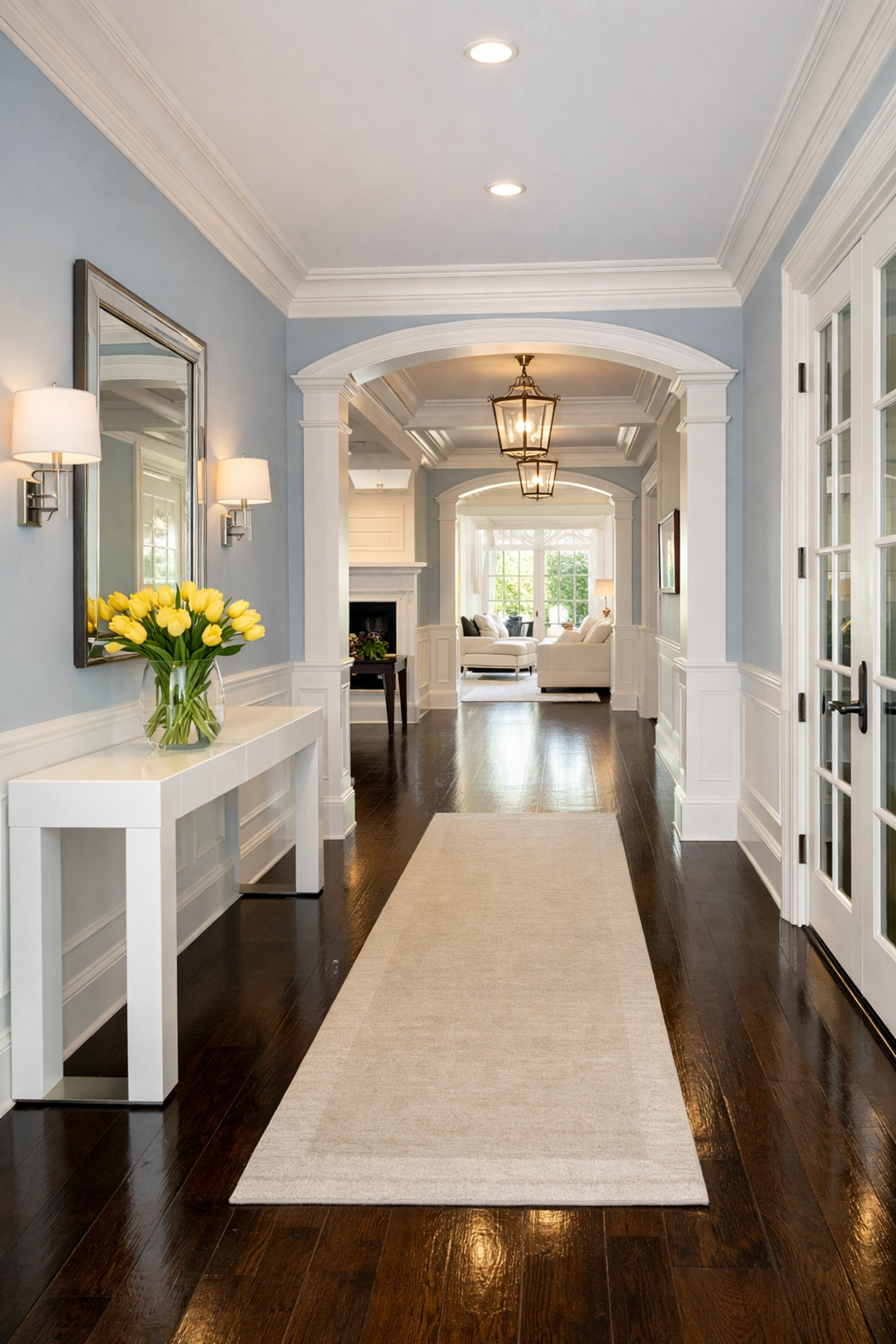Professional cleaners Natick MA showcase a pristine hallway with gleaming dark hardwood floors.