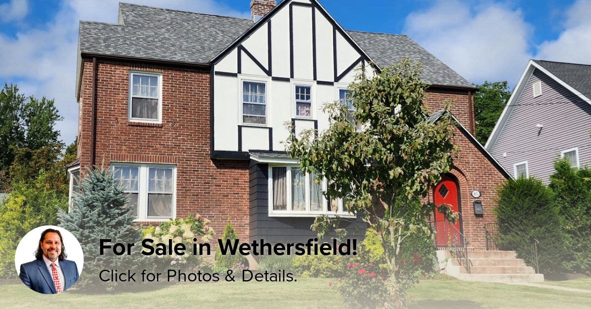 Classic Tudor-style brick colonial home