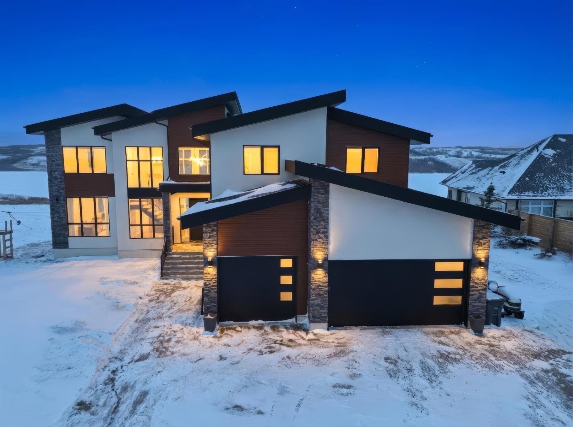Aerial twilight photo of modern luxury home