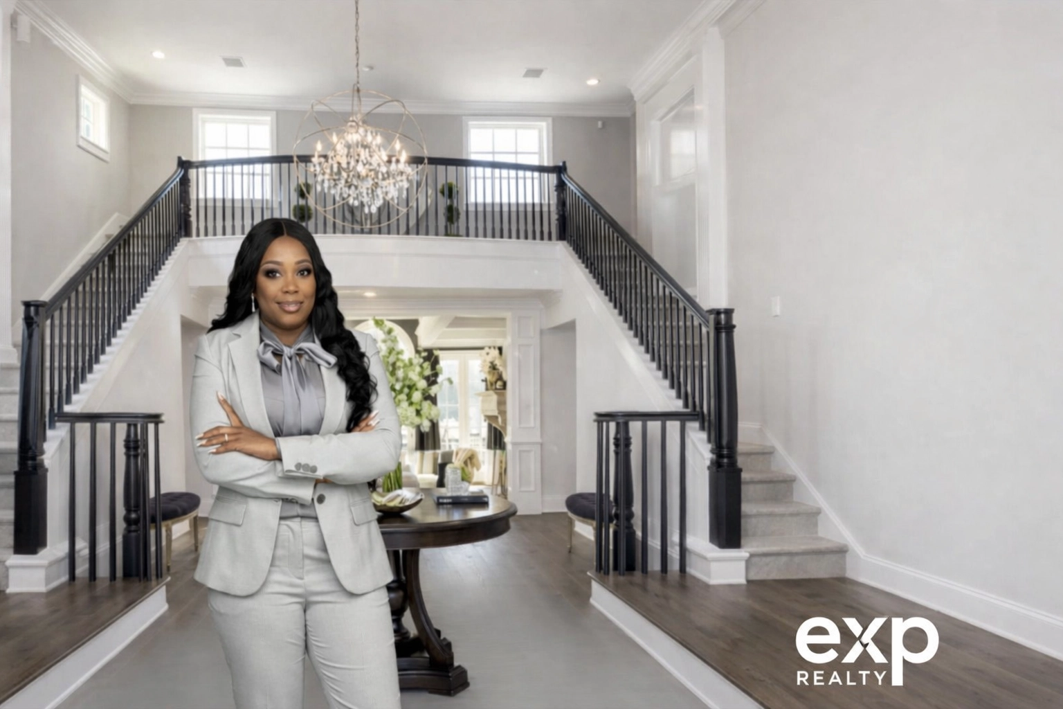 [HERO] Michelle in Home Foyer | 600x400 | small white eXp logo bottom-right