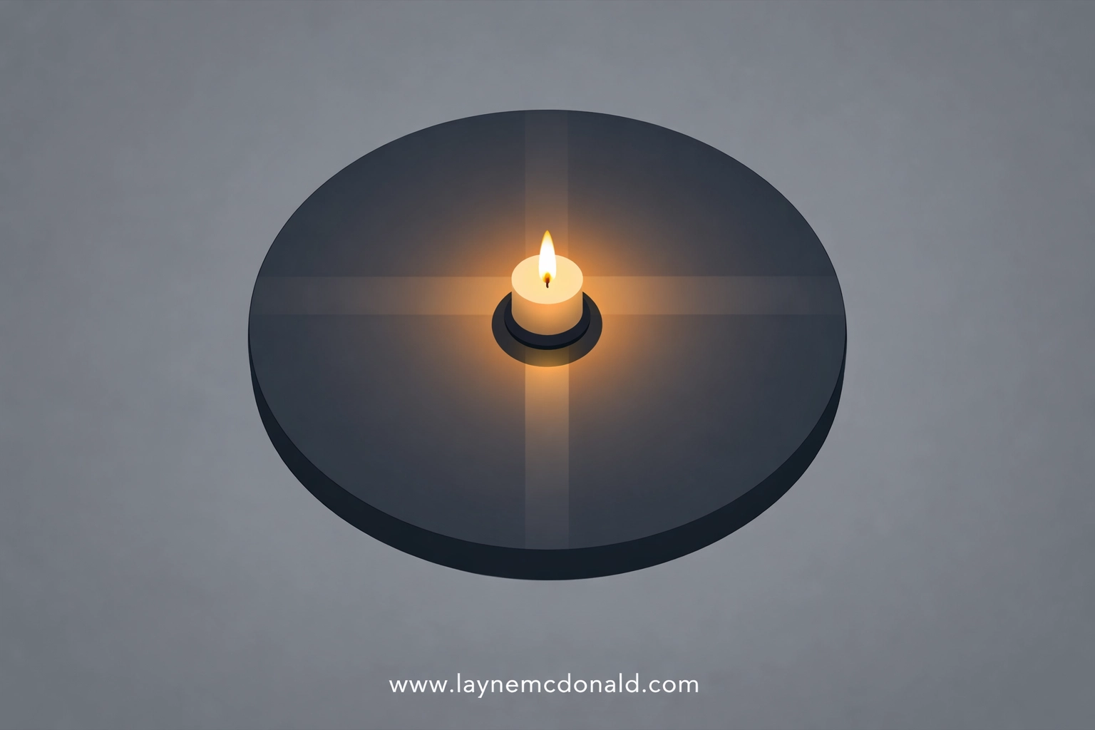 A glowing candle forming a cross on a table, representing daily faith rhythms and rituals. www.laynemcdonald.com