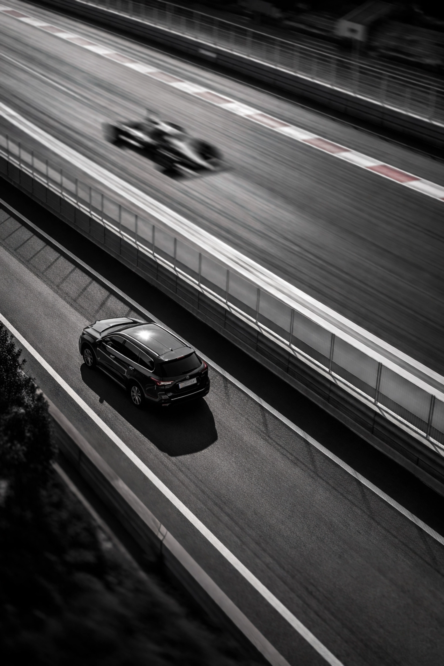 Executive SUV on VIP route at Formula 1 race track, highlighting seamless event transport