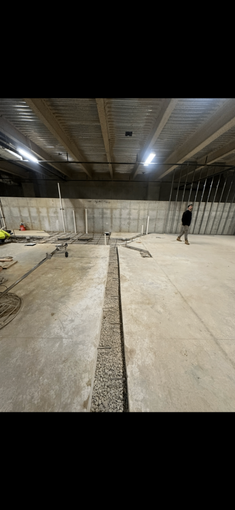 Commercial demolition and renovation prep showing concrete trench cut