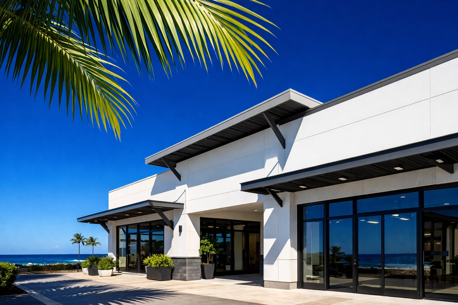 Modern storefront in Kailua-Kona under bright tropical sun, showing intense UV exposure conditions.