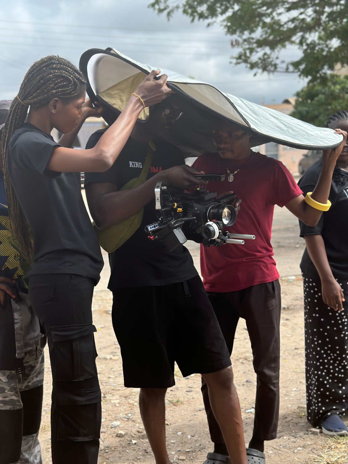 The team grind on set