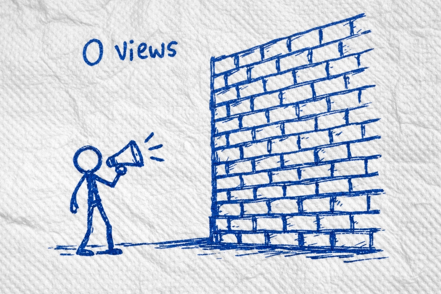 Napkin sketch of a creator shouting at a brick wall representing 0 views content stagnation