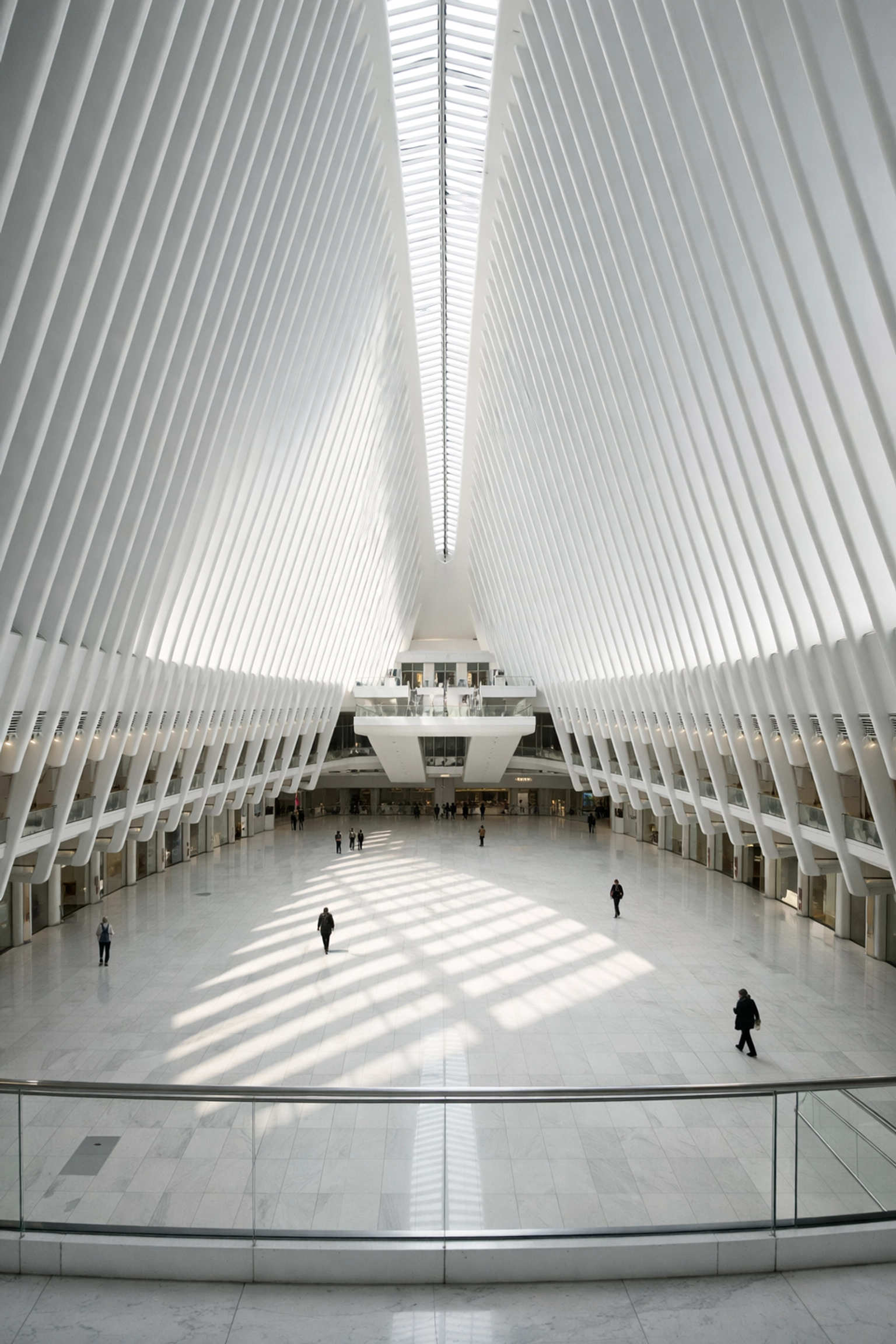 Symmetrical white architecture of the Oculus at World Trade Center, a unique New York City photography location.
