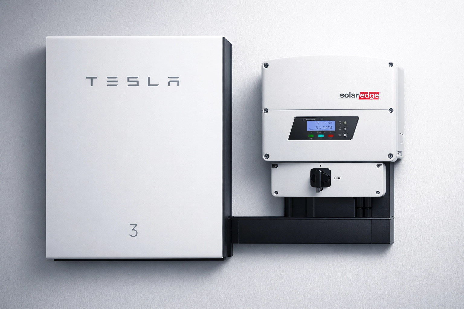 Professional installation of a Tesla Powerwall 3 and SolarEdge inverter in a modern UK utility room.