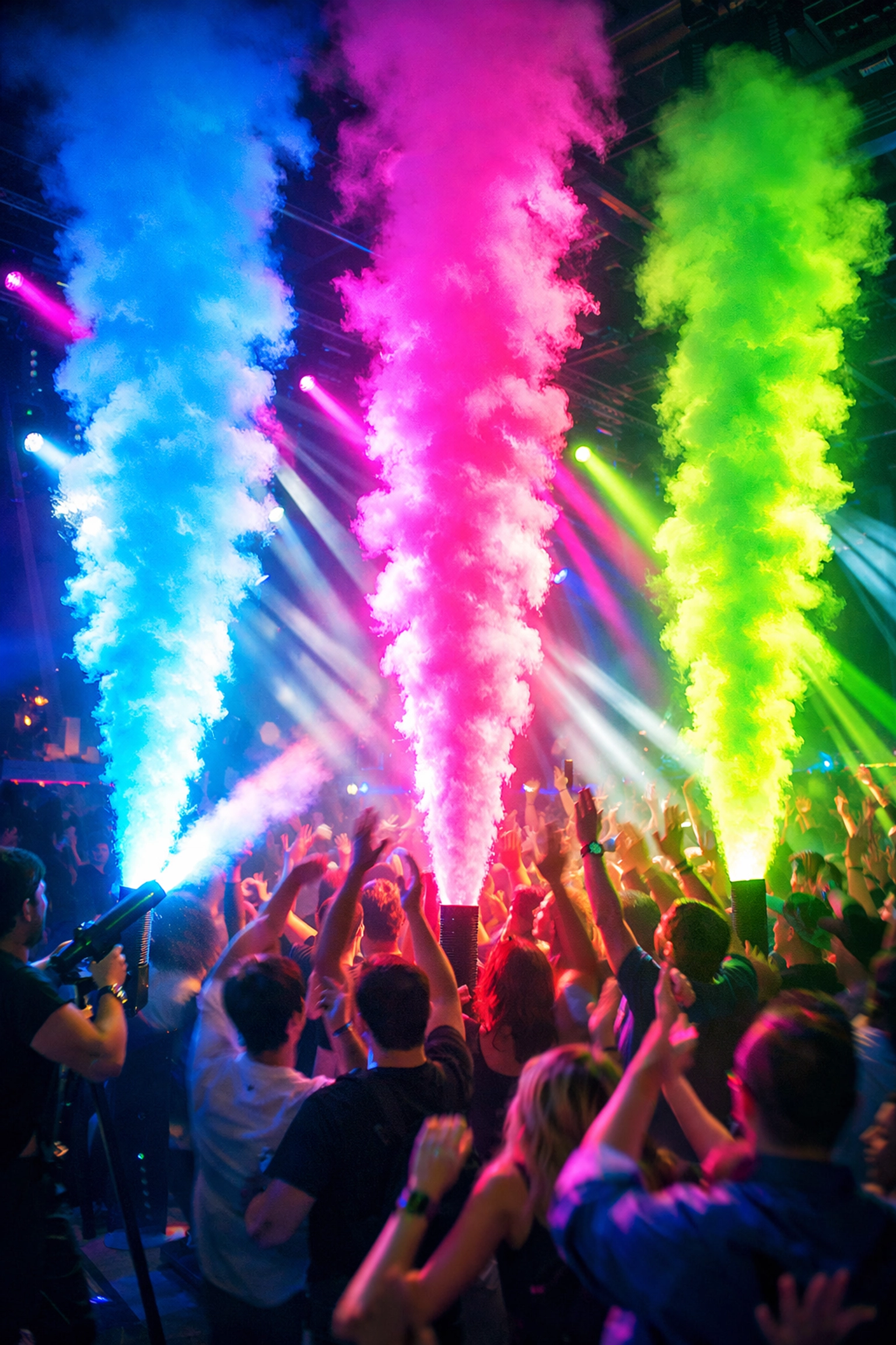 CO2 LED Cryo Guns create colorful fog columns on packed dance floor at high-energy party