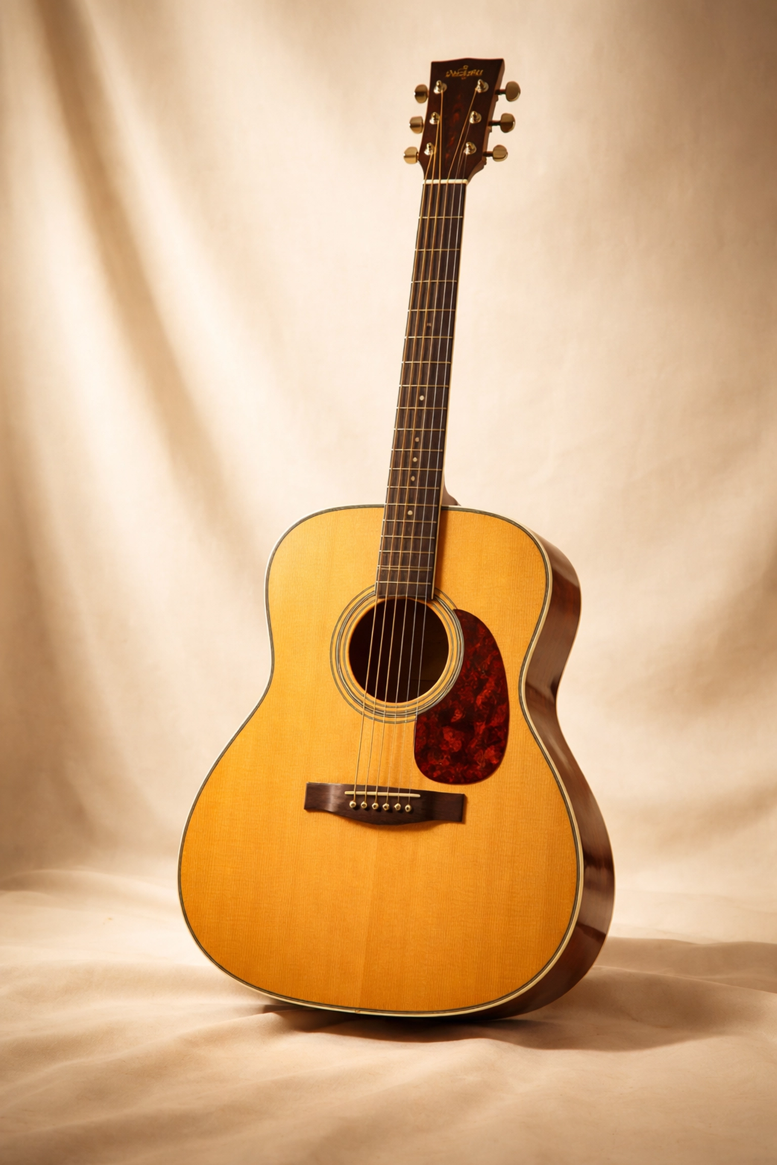 Classic Martin acoustic guitar similar to Cobain’s MTV Unplugged model, shown with warm lighting on cream backdrop