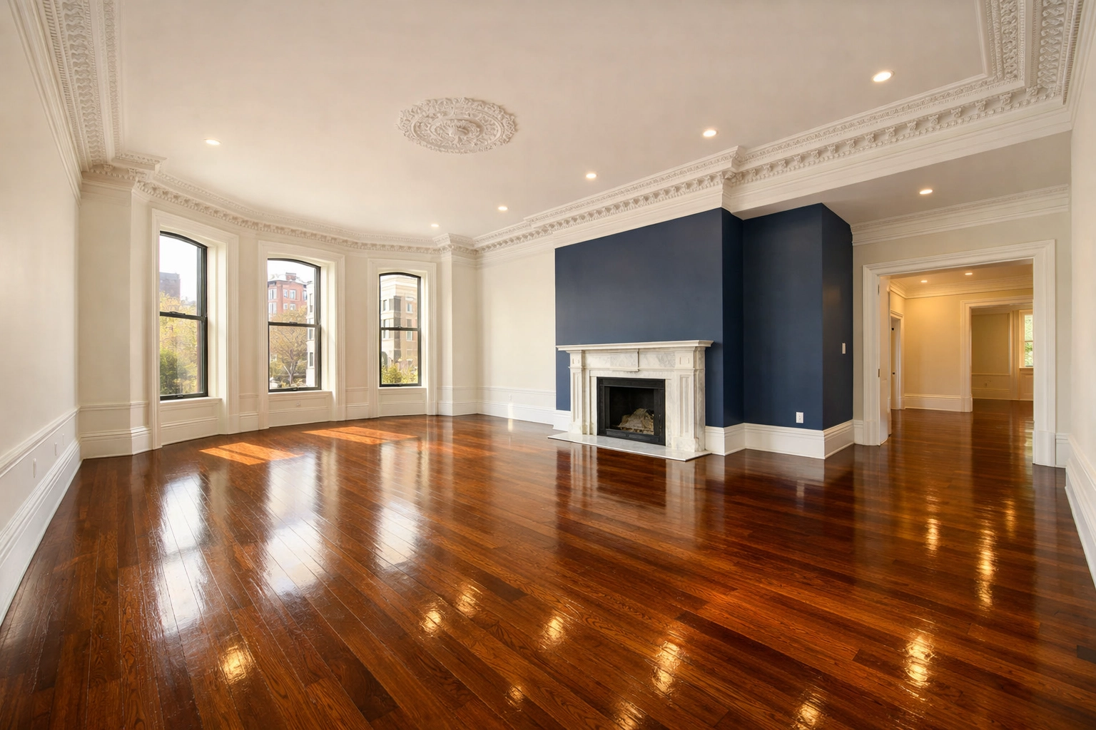 Spotless empty living room in a Boston brownstone after a move-out cleaning service in Massachusetts.