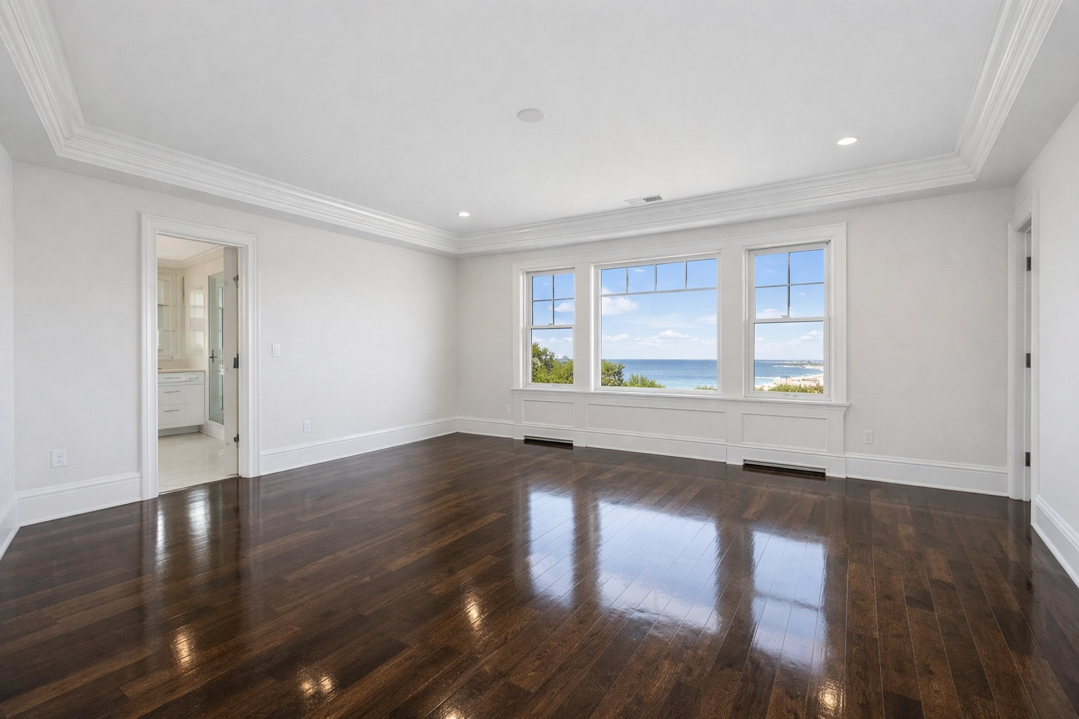 Spotless coastal bedroom featuring floors cleaned by a reliable house cleaning service Marblehead MA.