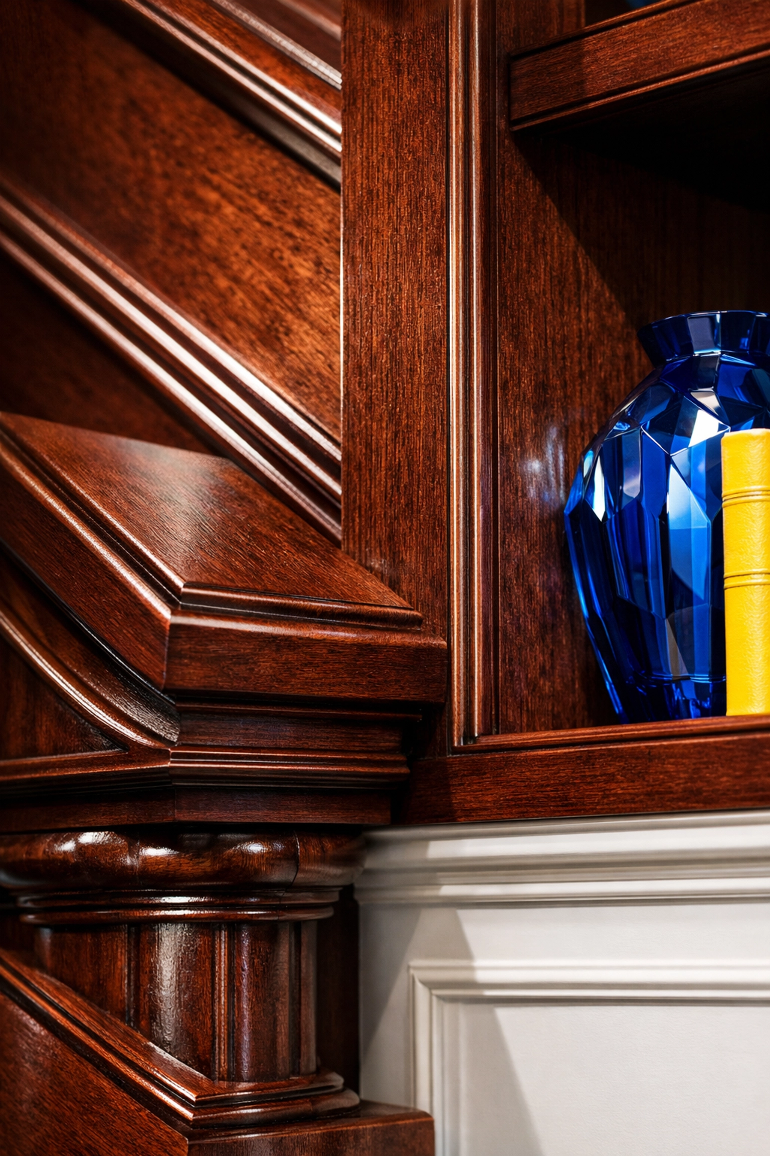 Detailed close-up of a dust-free mahogany staircase in a Sudbury home after a professional deep clean.