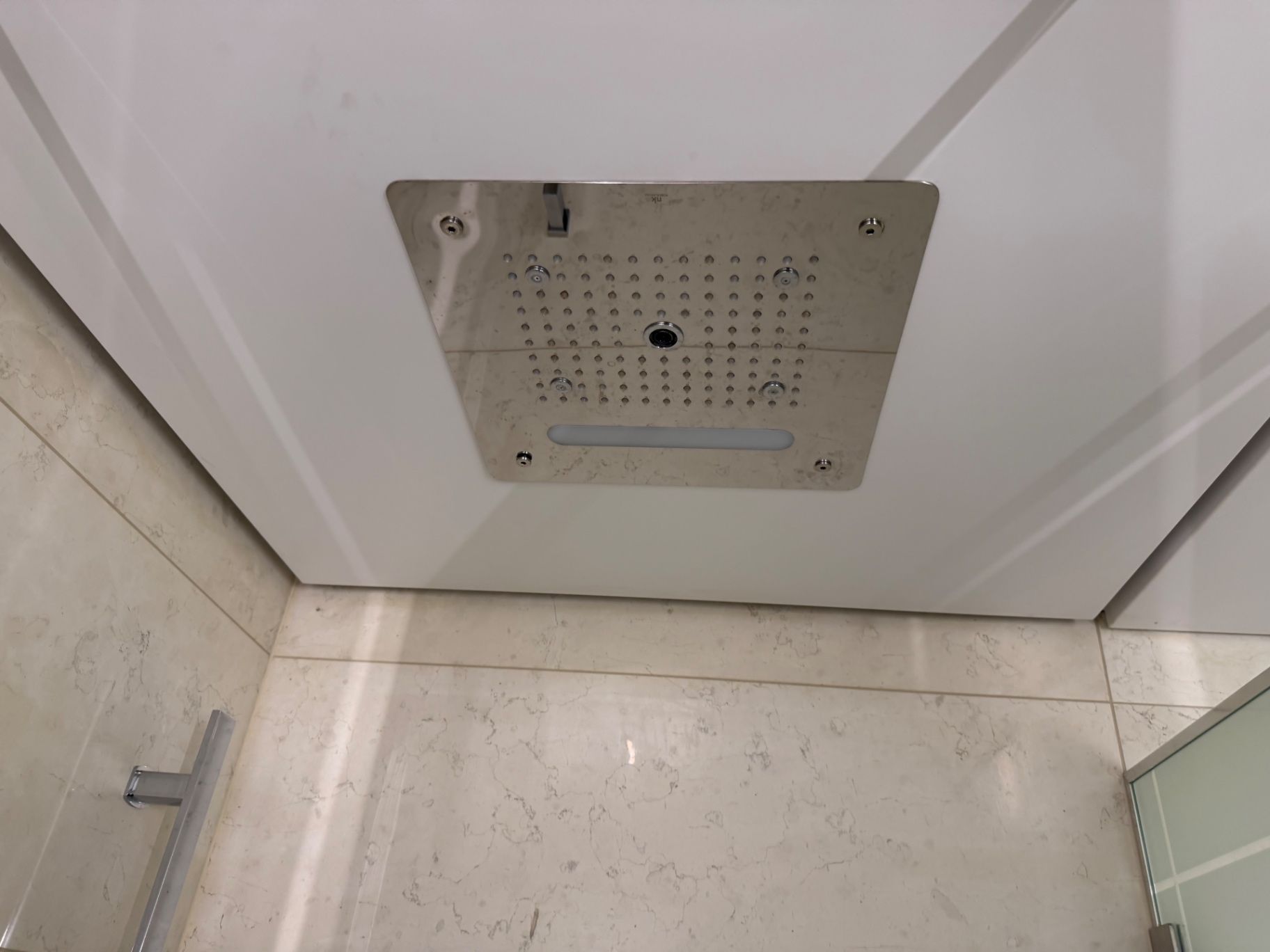 a shower head in a bathroom