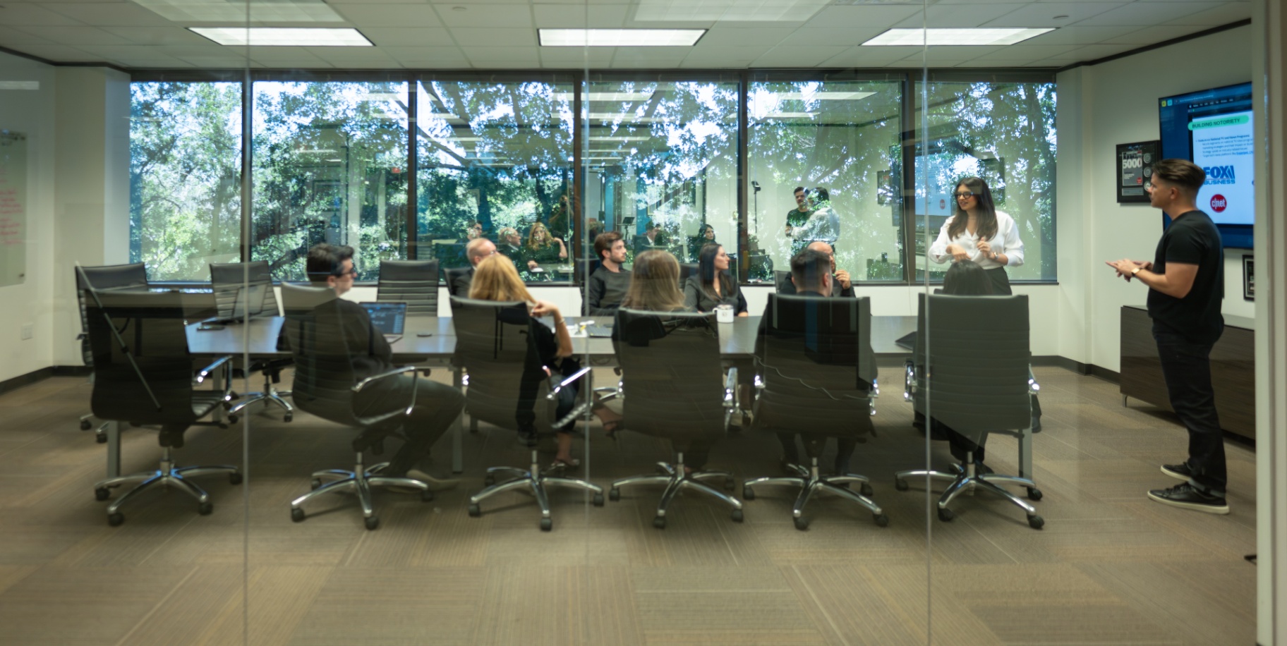 Disrupt PR team members in a meeting