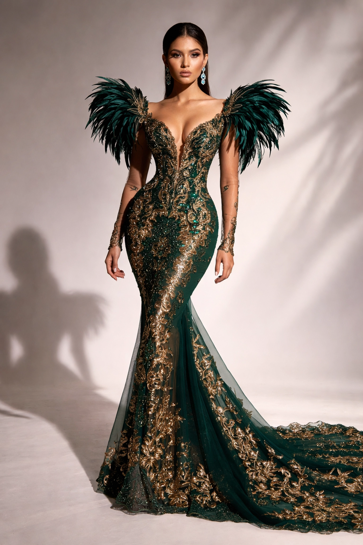 Latina model in an emerald and gold couture gown showcases Latin Fashion Awards elegance and craftsmanship.