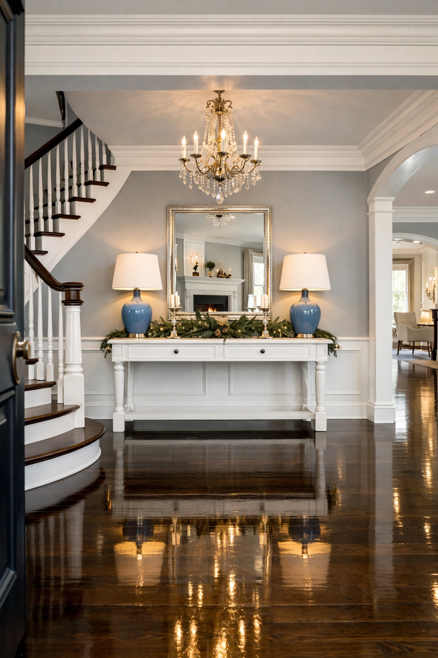 Immaculate Lancaster home foyer with polished hardwood floors and festive holiday decor.
