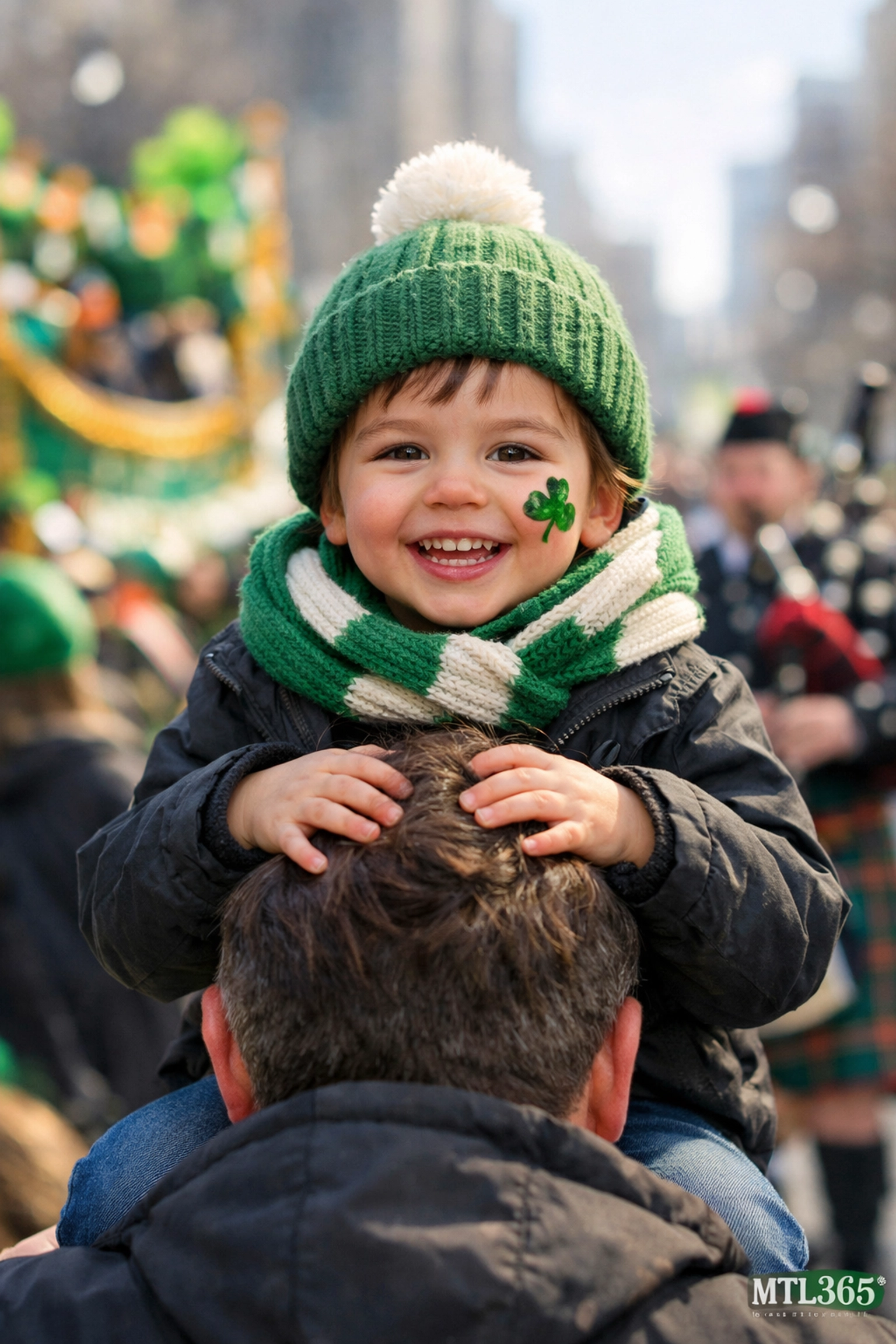 A smiling child with shamrock face paint enjoying the Montreal St. Patrick’s Day Parade festivities.