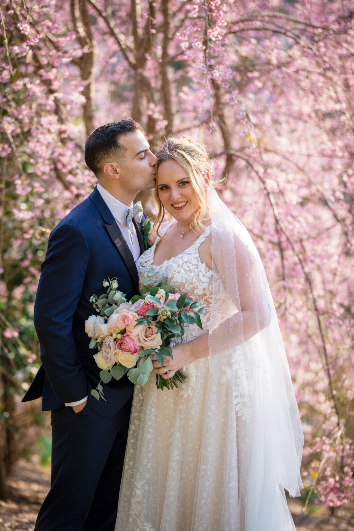 Ashley and Michael share an intimate forehead kiss at Glasbern Inn