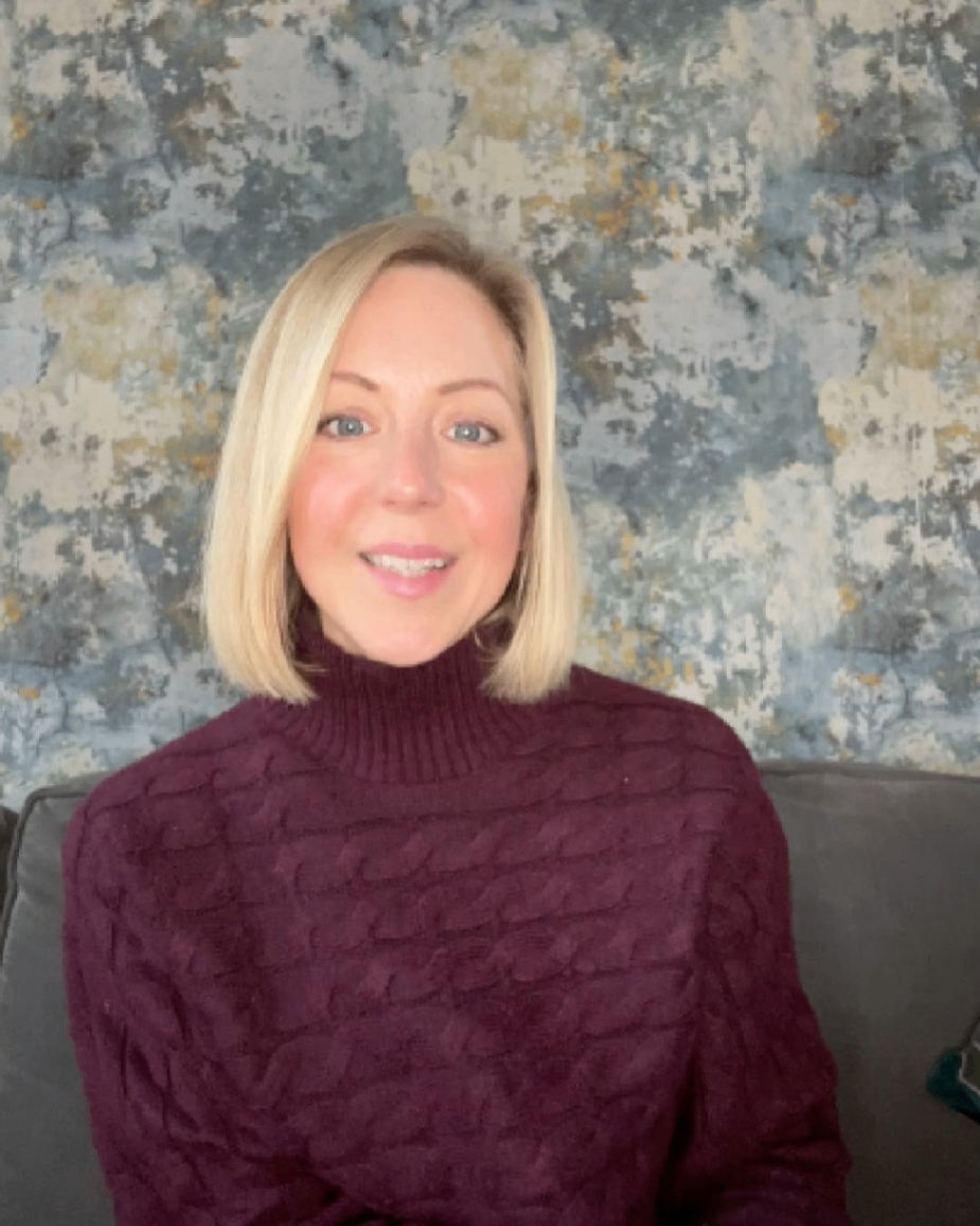 A woman with shoulder-length blonde hair on a sofa A woman with shoulder-length blonde hair on a sofa