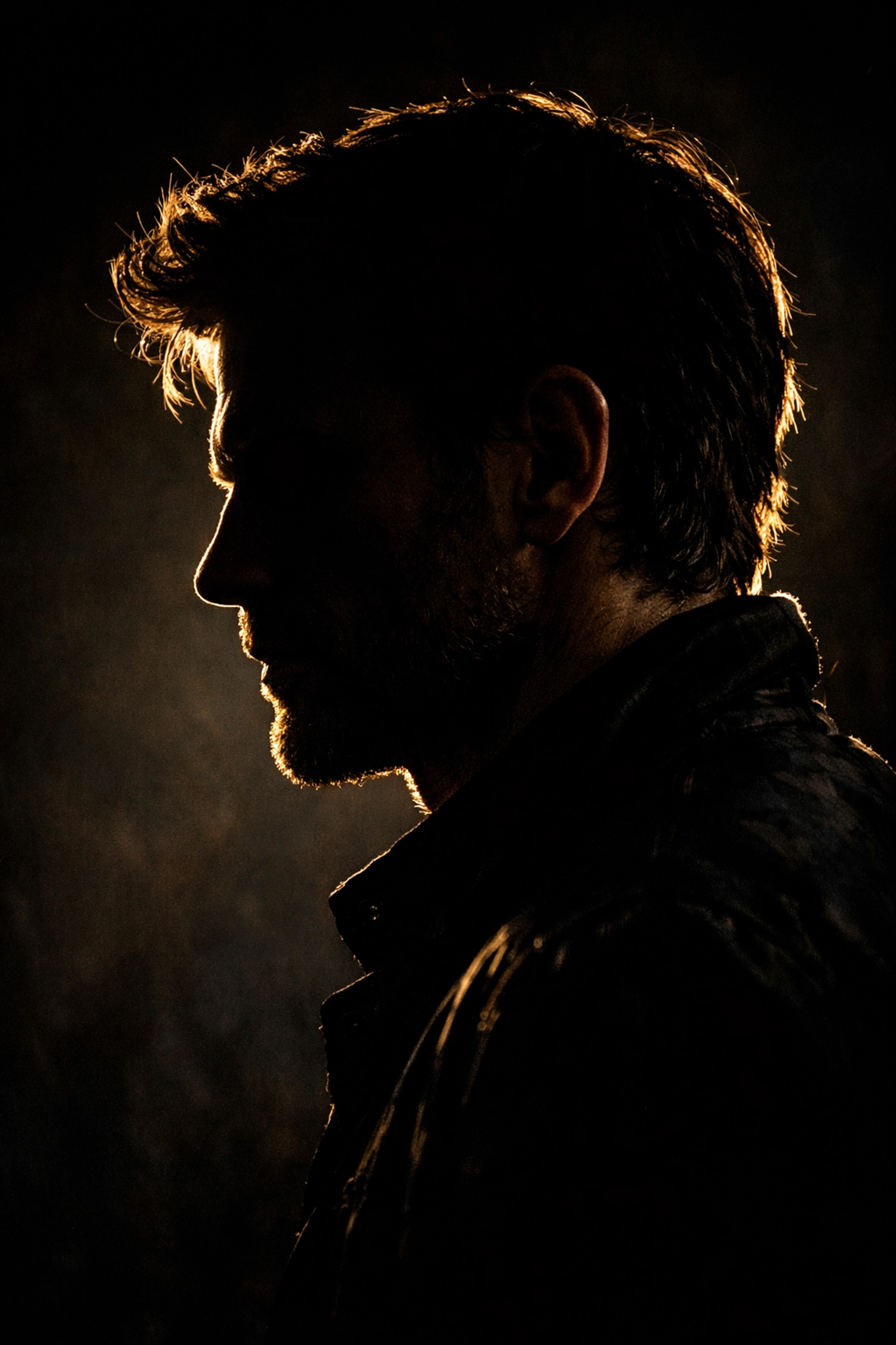 Dramatic rim-lit portrait showing creative light use to overcome technical manual mode mistakes.