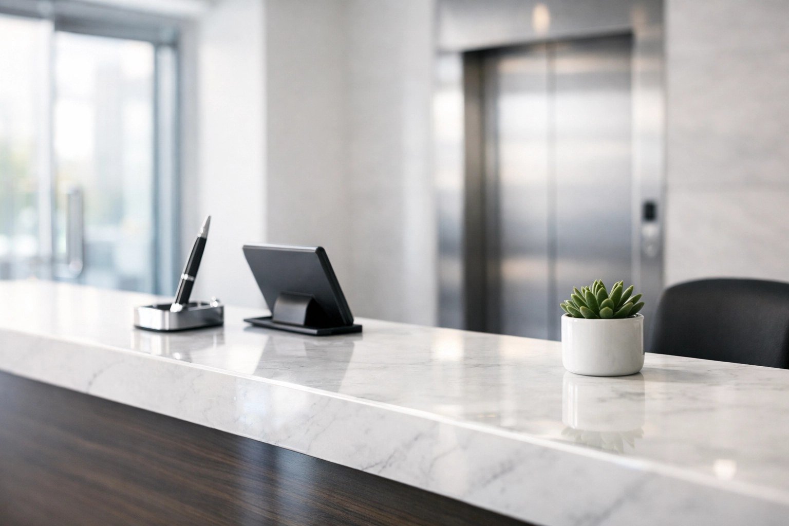 Pristine modern office reception area with polished marble desk showing daily commercial cleaning standards.