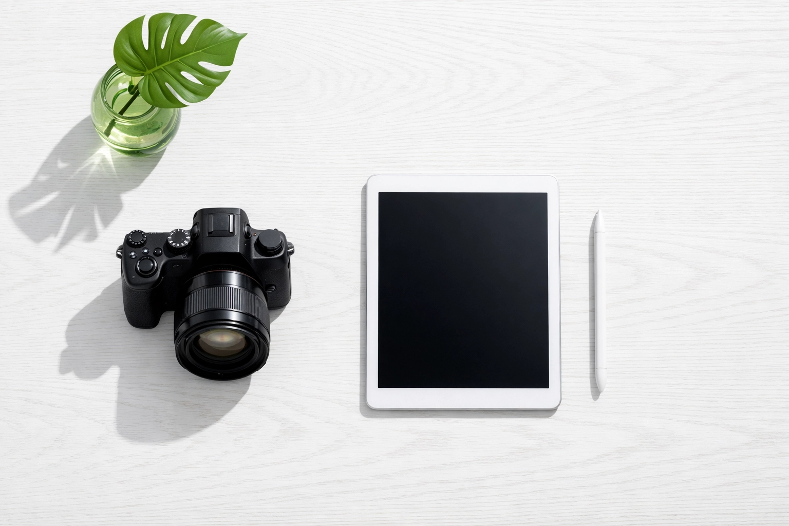 Digital camera and tablet representing diverse content formats for better search engine visibility.