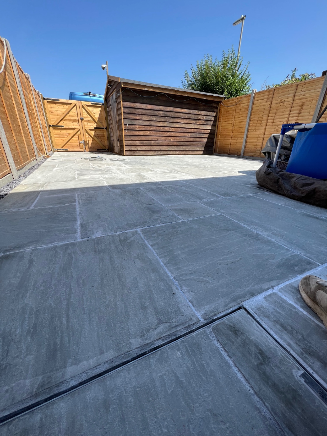Freshly installed stone patio paving