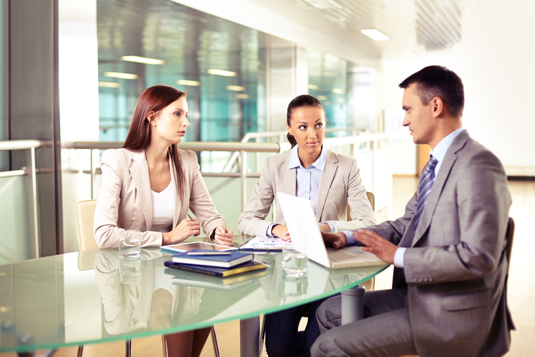 Business professionals reviewing tax strategy documents