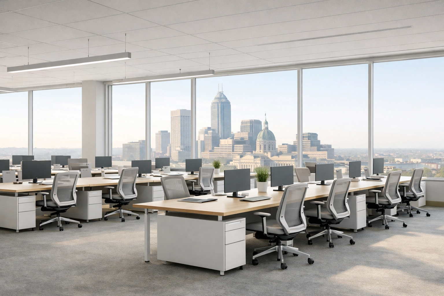 A bright, professionally cleaned Indianapolis corporate office with organized desks and clean surfaces.