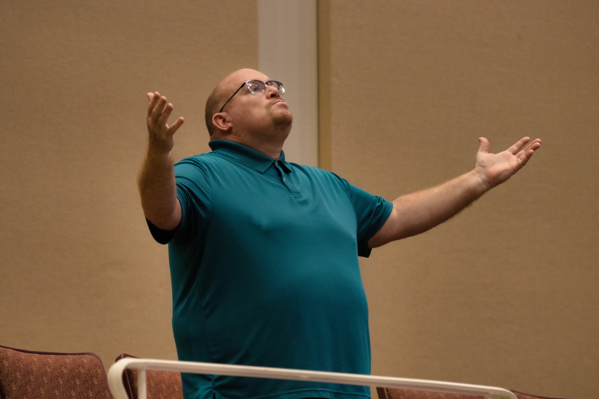 Man Worshipping in Church Sanctuary