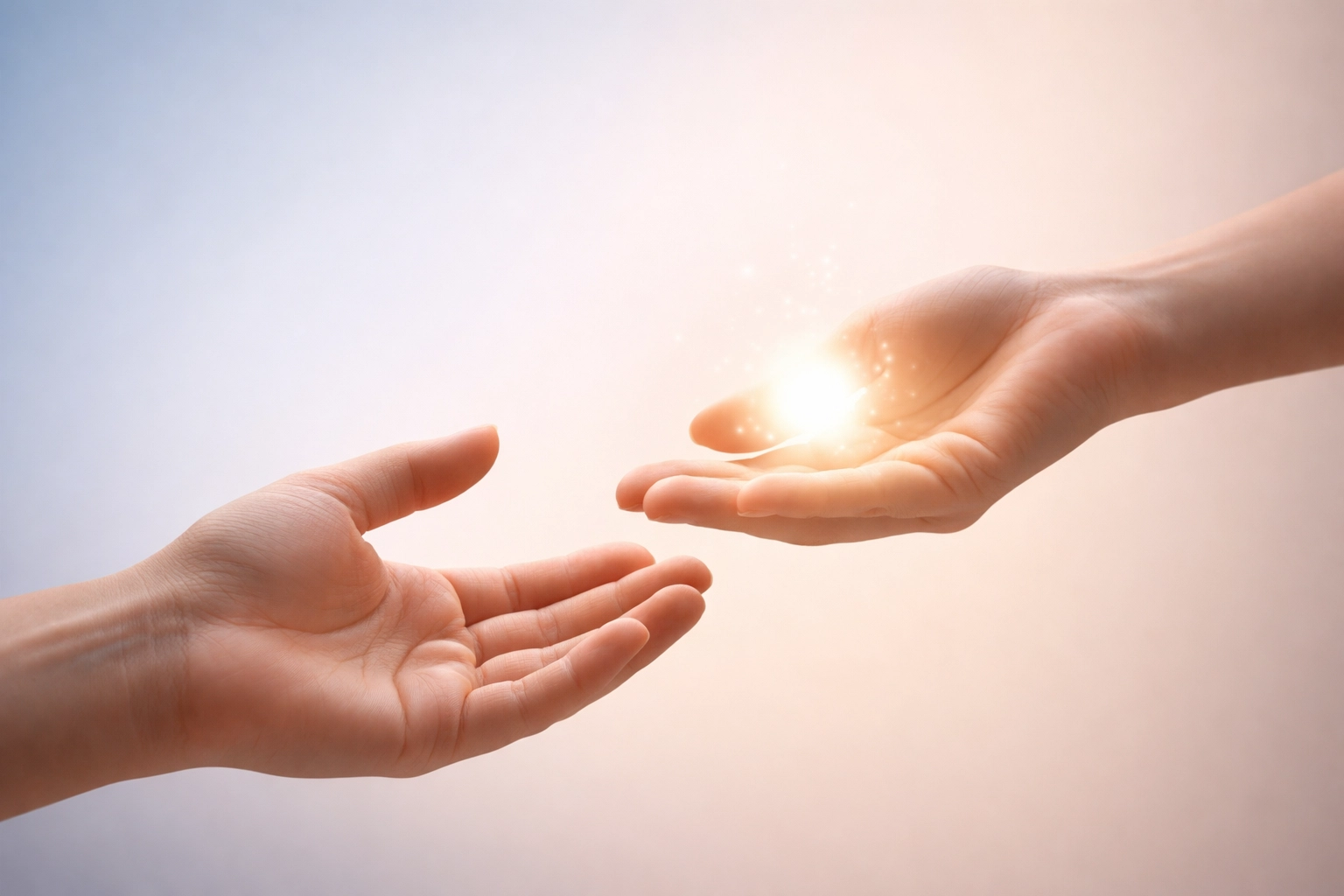 Hands exchanging a glowing orb of light, symbolizing emotional learning in memory reconsolidation strategies