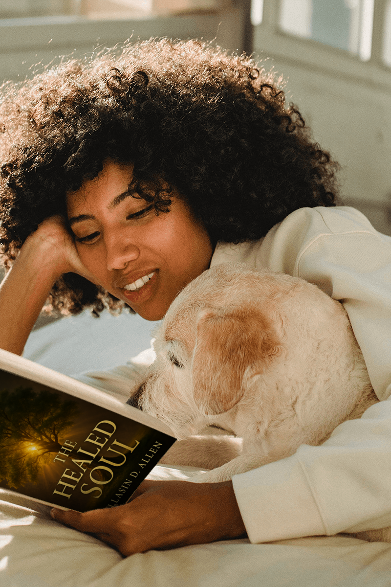 Woman Relaxing with Dog and 'The Healed Soul' Book