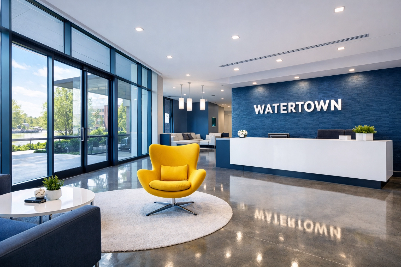 Spotless modern boutique office lobby in Watertown, MA with polished floors and clean glass windows.