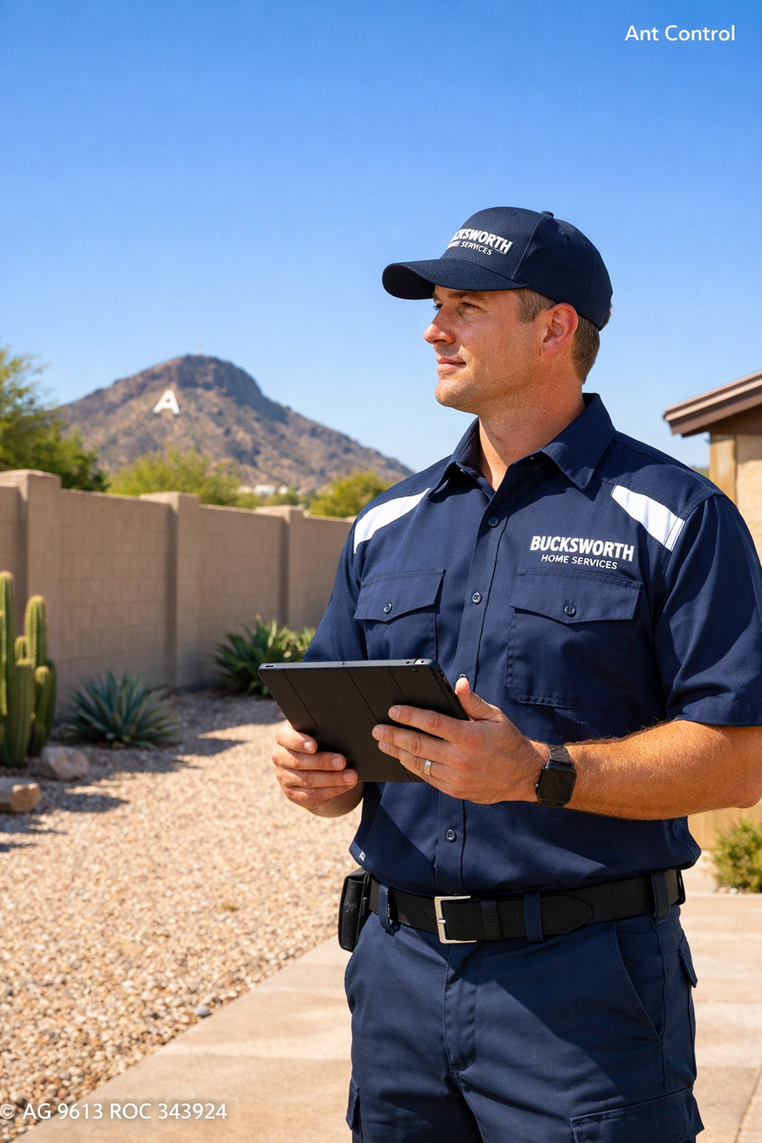Bucksworth Home Services technician conducting a professional ant control inspection in a Tempe AZ backyard.