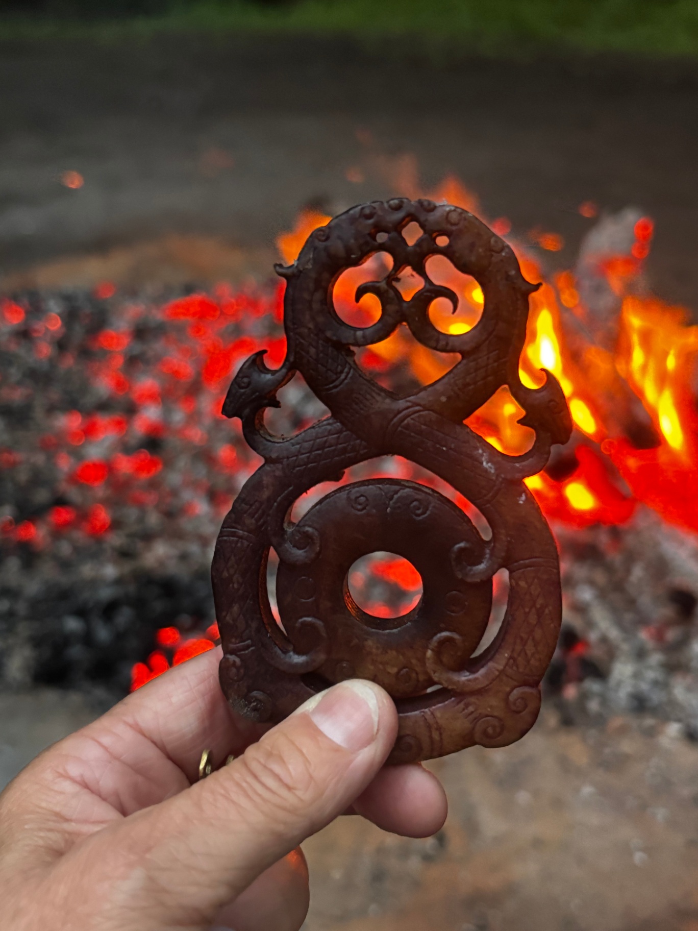 Snake talisman and coals Snake talisman and coals