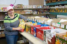Woman organizing supplies for Empteez.ca fundraiser