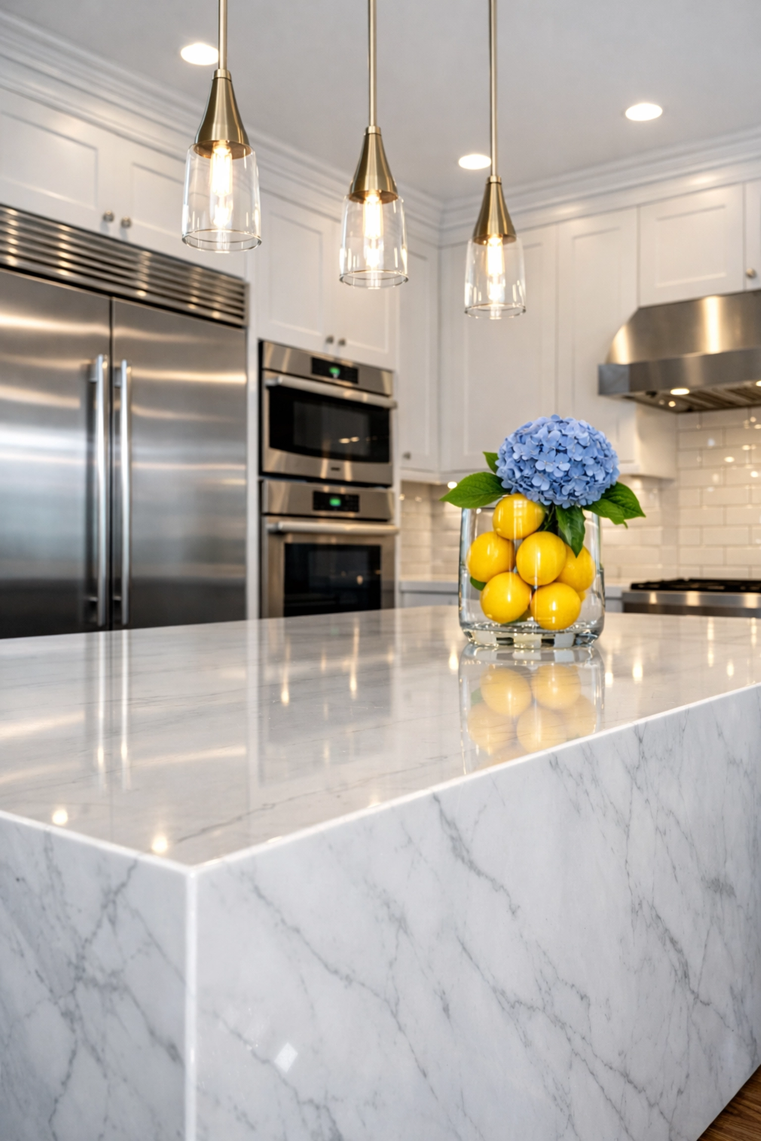 Spotless luxury kitchen with streak-free marble island and sparkling appliances after residential cleaning in Massachusetts.