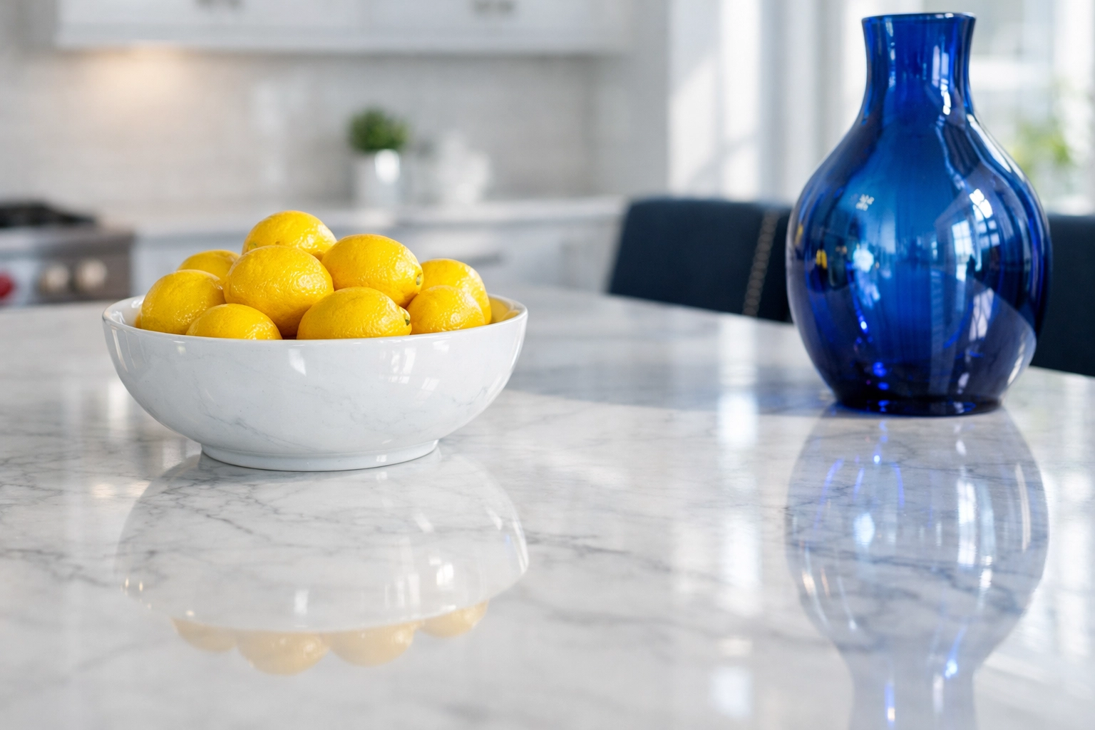 Sparkling clean white marble kitchen island in a Westford home after a professional deep cleaning service.