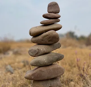 Stacked stones representing a stable financial foundation
