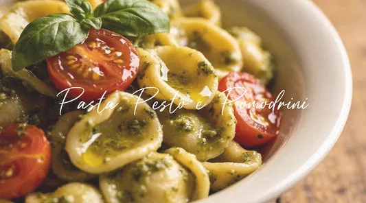 Orecchiette with basil pesto and cherry tomatoes