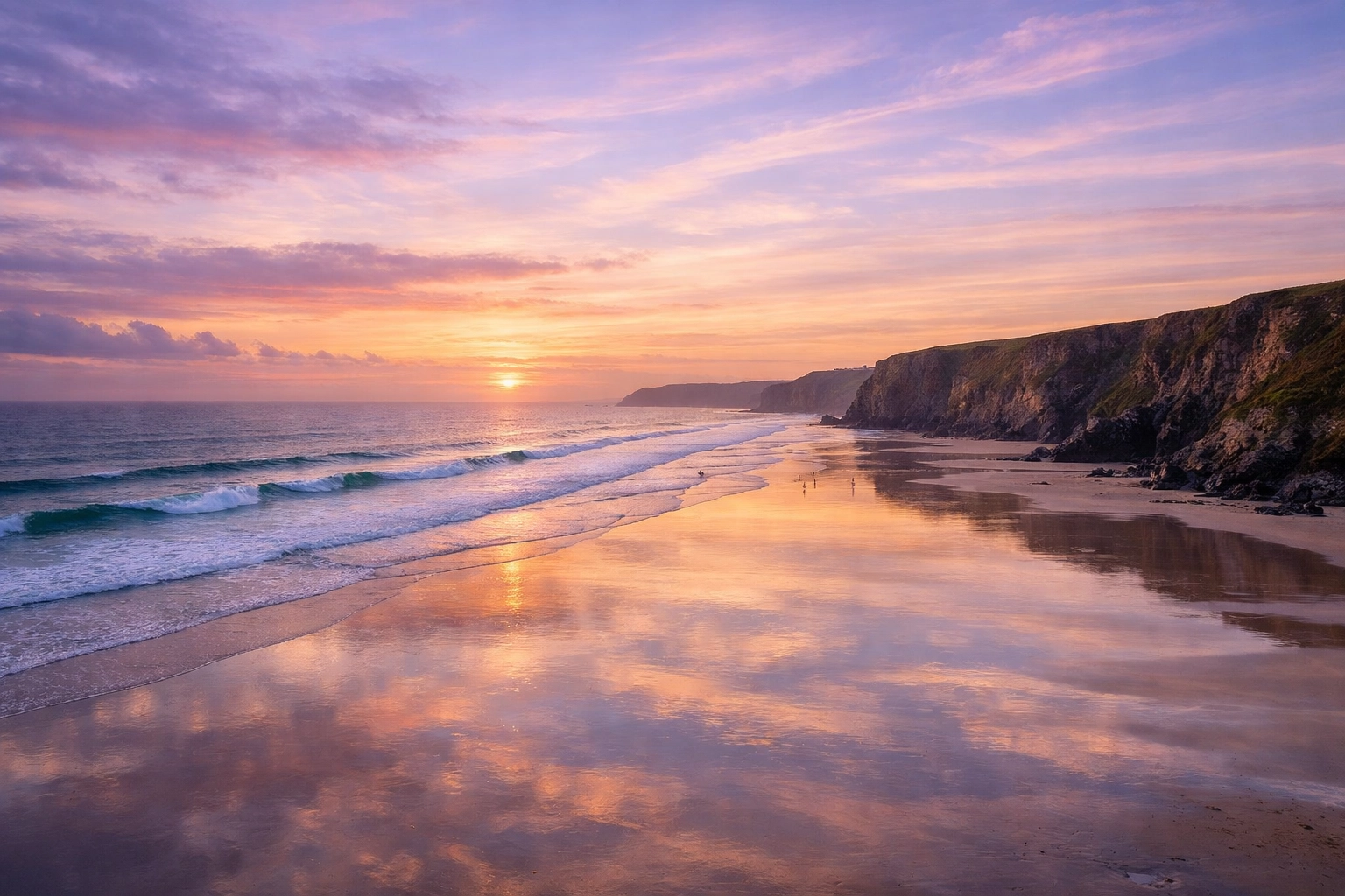 Serene sunset over the Atlantic at Watergate Bay, Cornwall, an ideal location for a coastal ashes scattering.