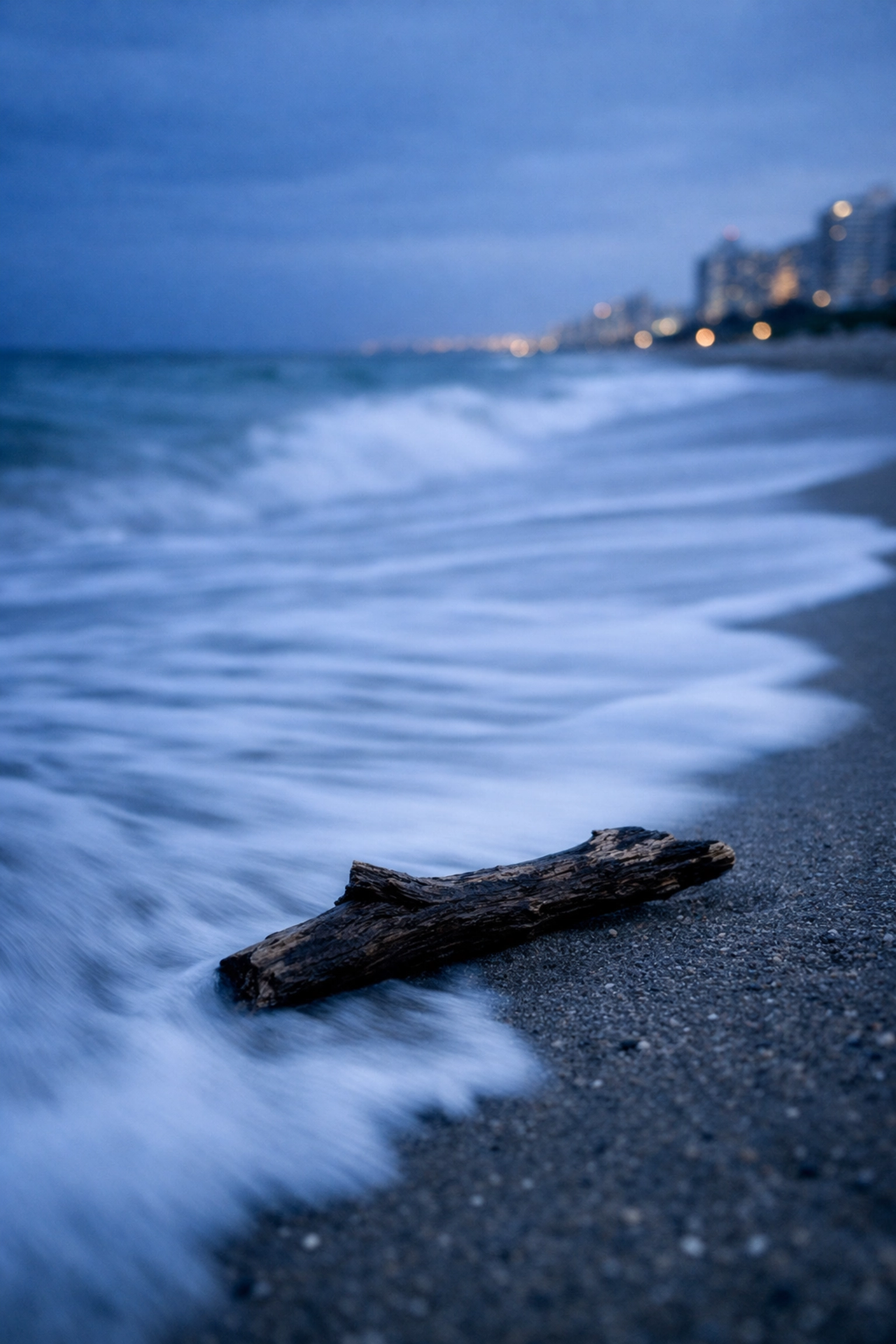 Dreamy photography editing of a Miami ocean tide with soft, silky water textures and a shallow depth of field.