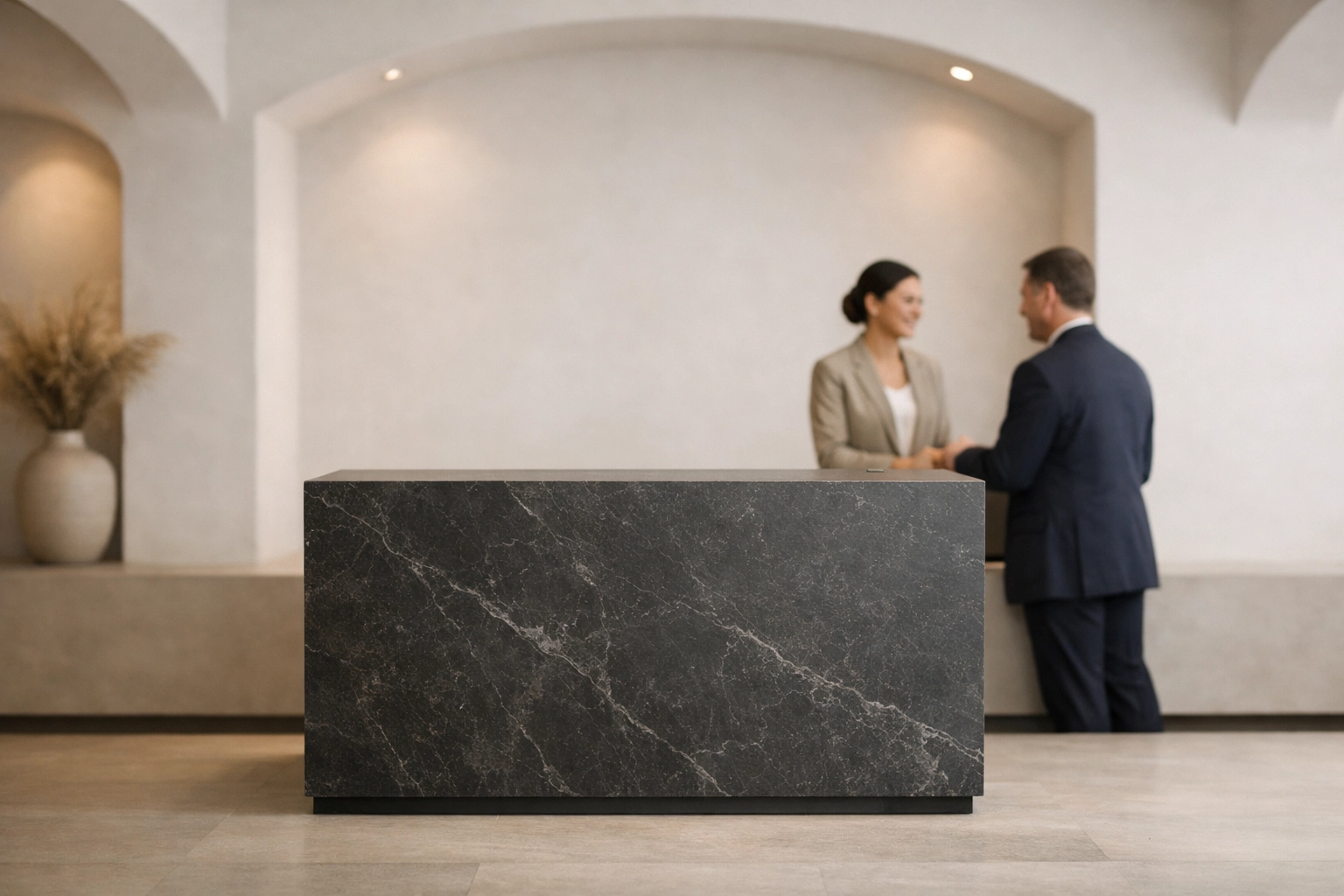 Modern minimalist hotel reception where AI-driven technology supports high-touch guest service.