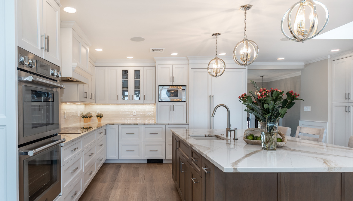 Custom kitchen design with waterfall edge island