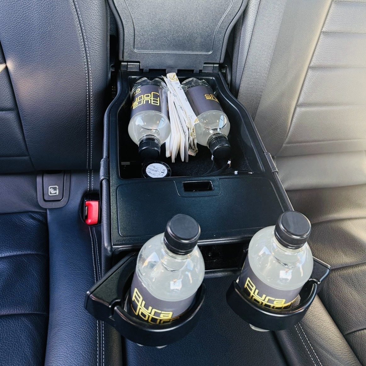 Every journey includes premium bottled water and a pristine interior to ensure maximum comfort.
