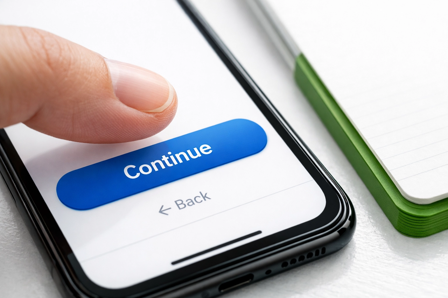 Close-up of a hand navigating a user-friendly mobile-responsive website on a high-resolution screen.