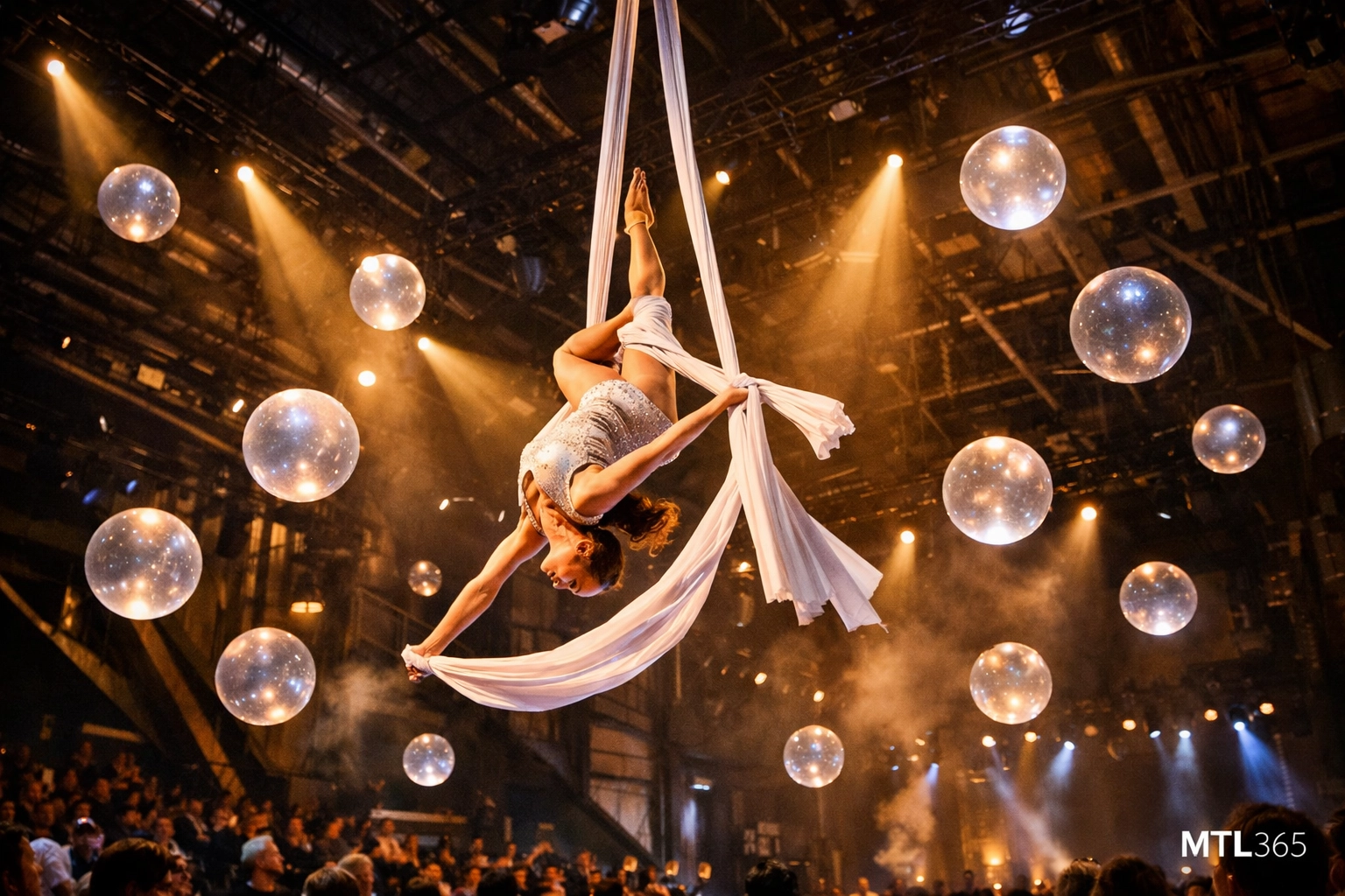 Aerial circus performer on white silks at a world-class immersive cultural event in Montreal.